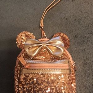 Rose gold Disney wristlet